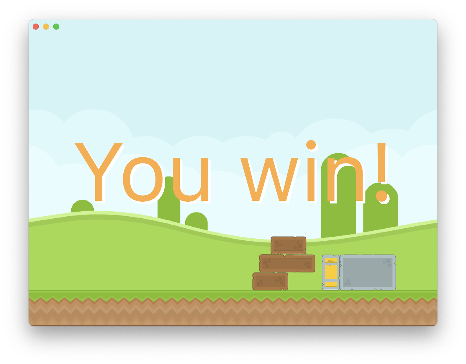 An app window with green hills in the background, ground layer, blocks on the ground and a text overlay of 'You win!'
