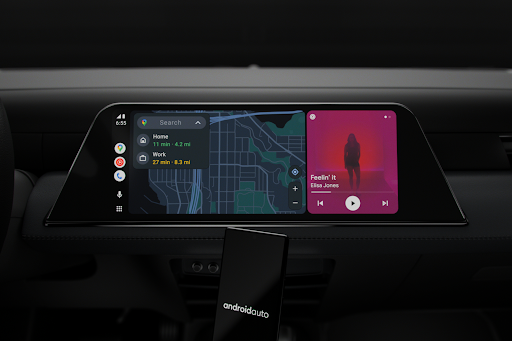 A car’s entertainment system is synced with Android Auto. The left side of the screen displays Google Maps, the right side plays YouTube Music.