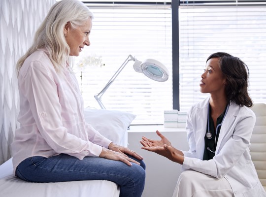 Photo of a patient and physician talking
